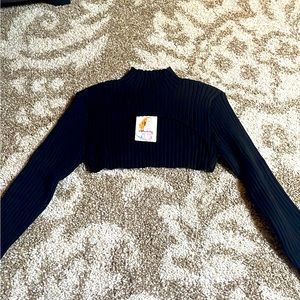 Cutout cropped turtleneck black shirt. Perfect for going out. Never worn.
